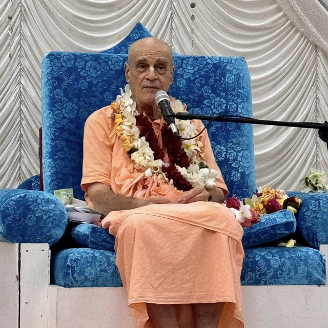 Devotee meditating with japa beads in a serene garden at dawn